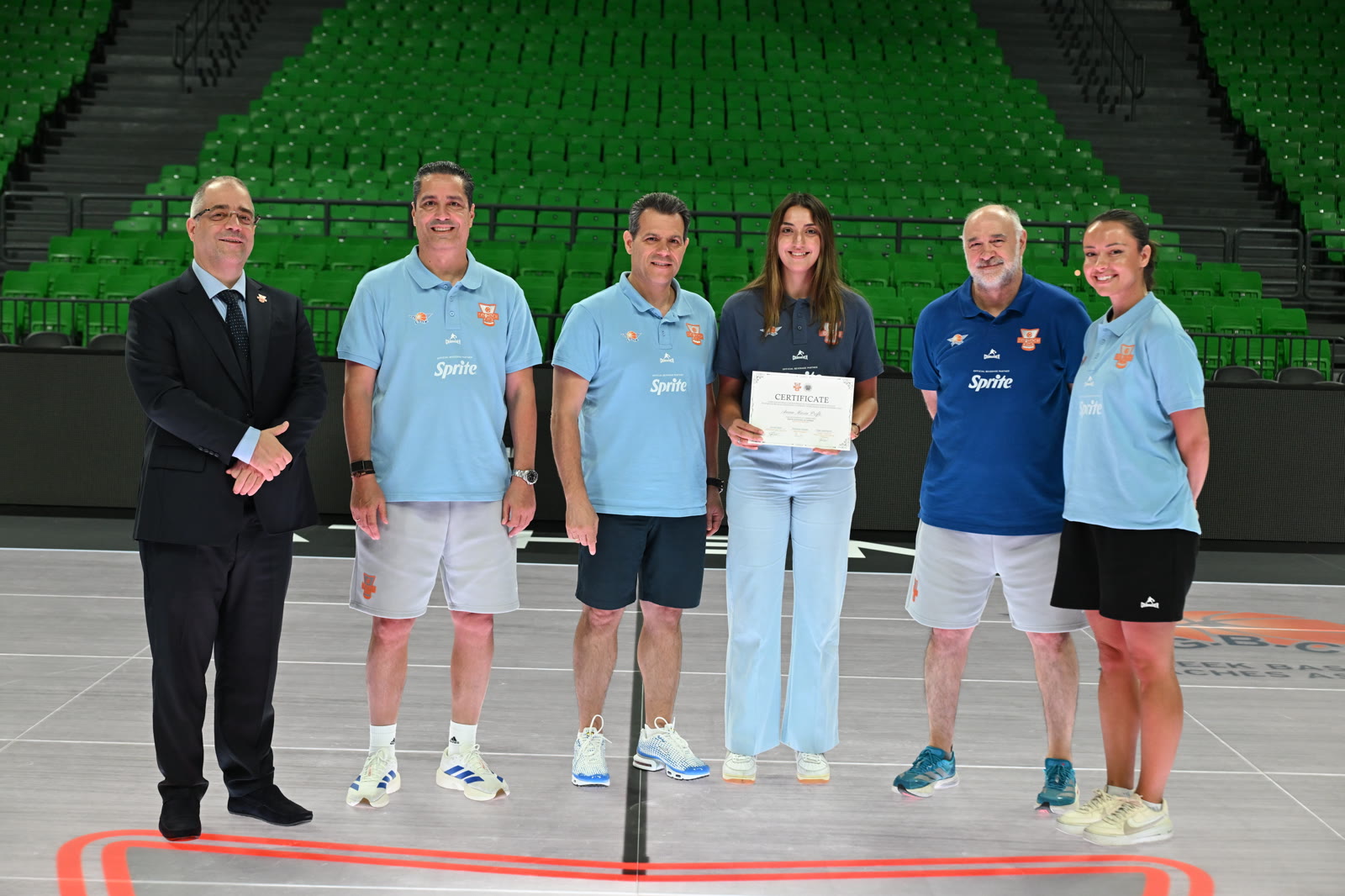 Academy participant receiving recognition from EHCB faculty
